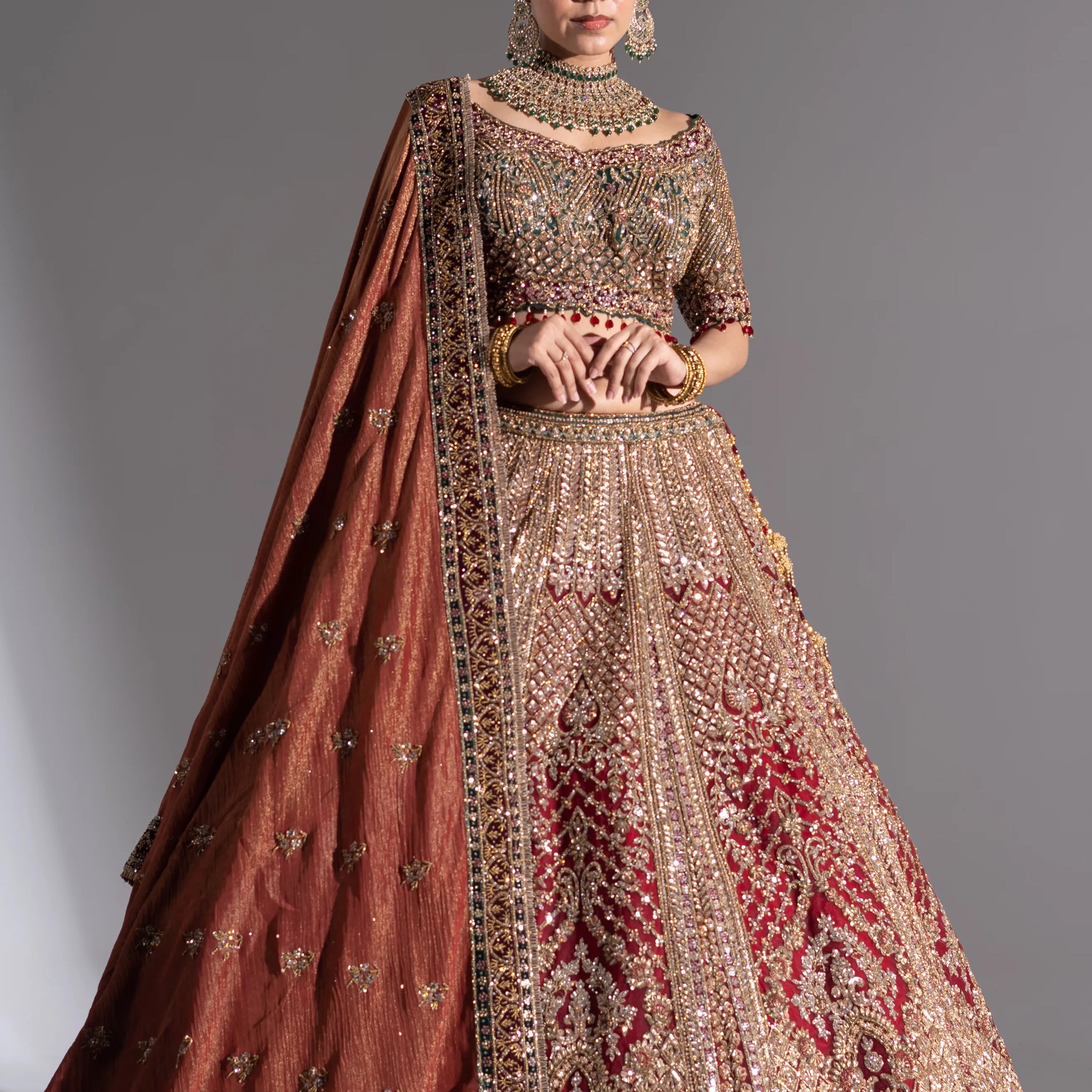 Rust Red & Antique Gold Heavy Zardosi Bridal Lehenga