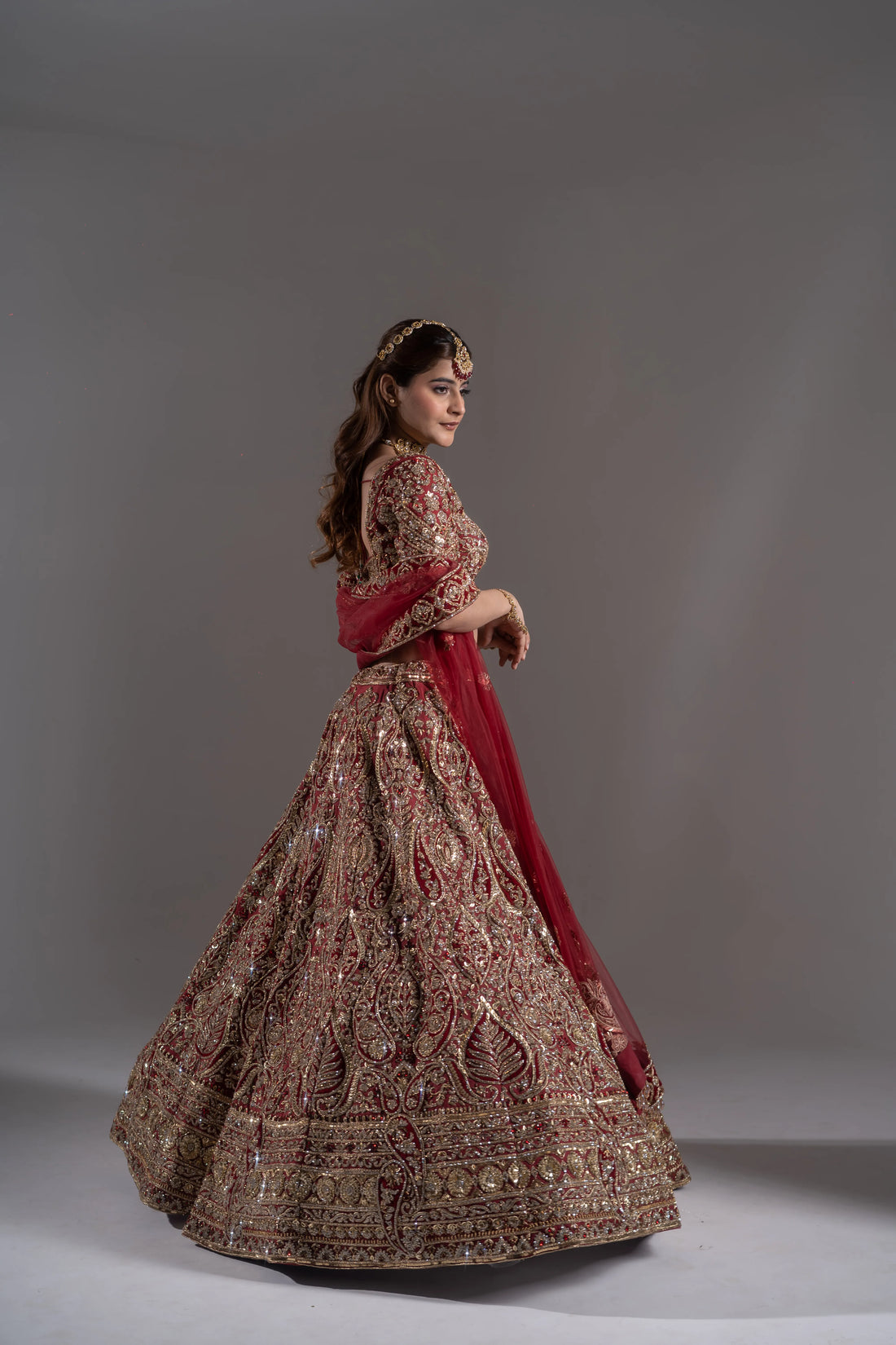 Maroon Majesty Emerald Embellished Bridal Lehenga Choli