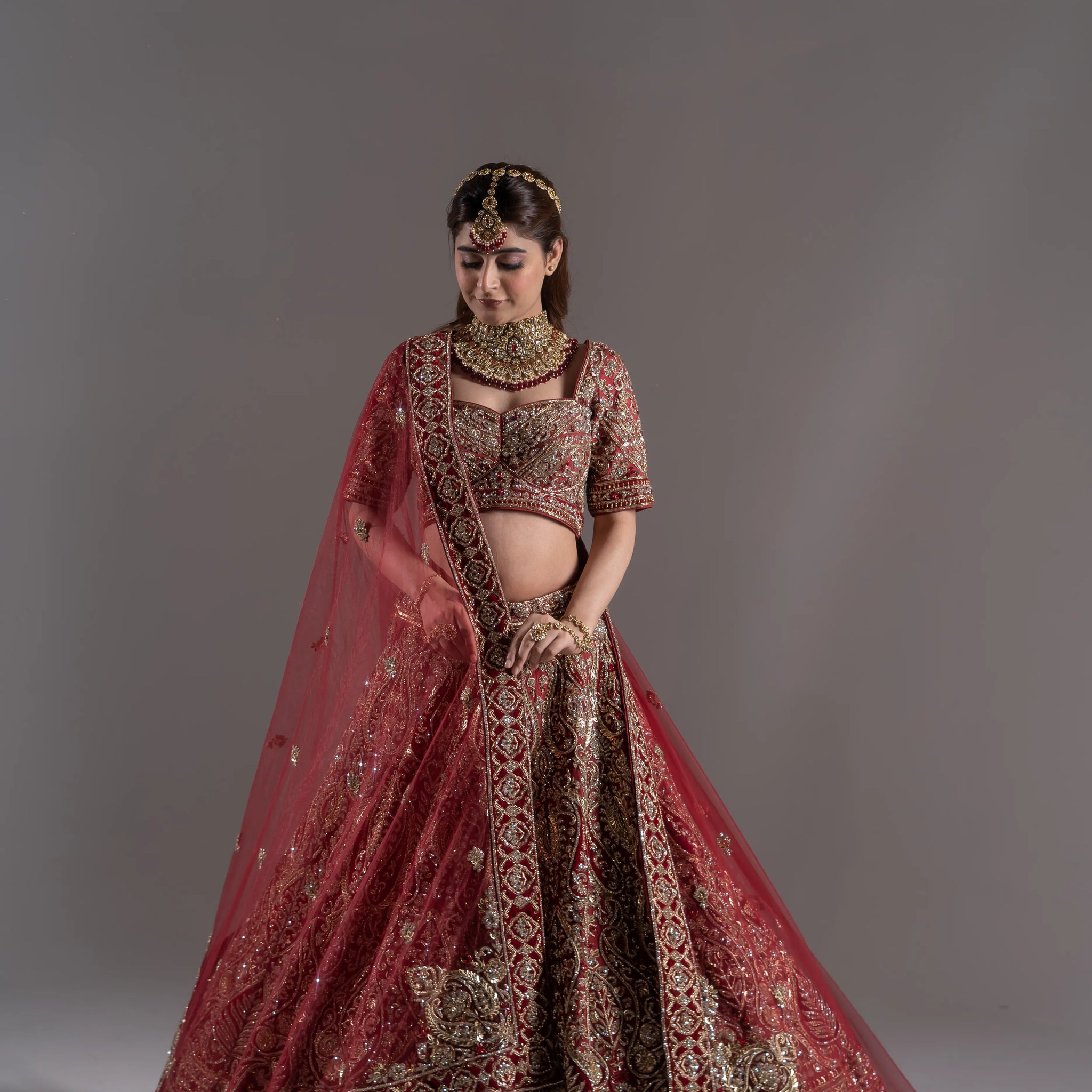 Maroon Majesty Emerald Embellished Bridal Lehenga Choli