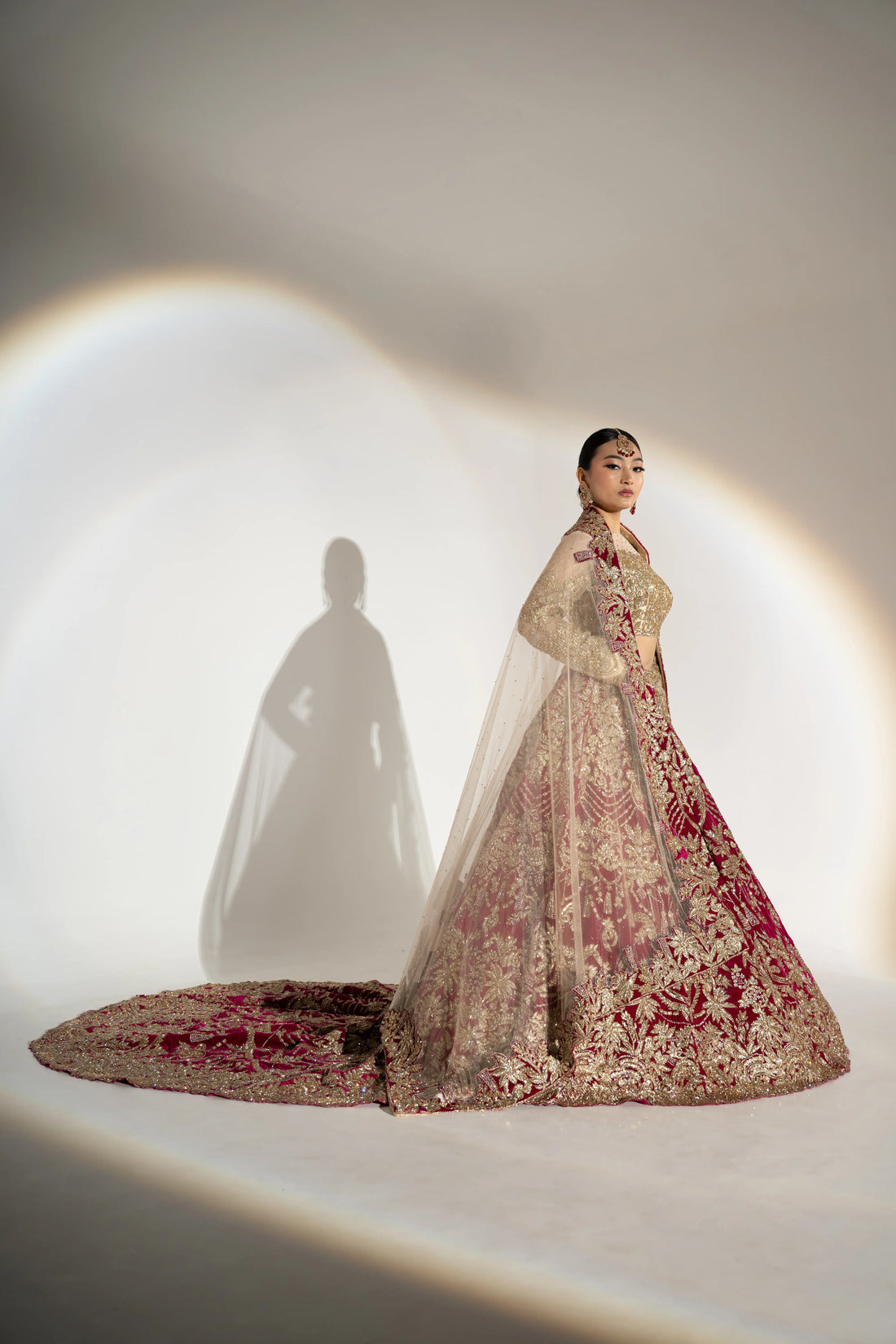 Deep Maroon Velvet & Gold Heavy Zardosi Bridal Lehenga With Royal Trail